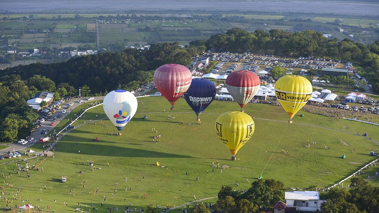 Hot air balloons seen from the air over the Luye Highland plateau during the Taiwan International Balloon Festival in Taitung