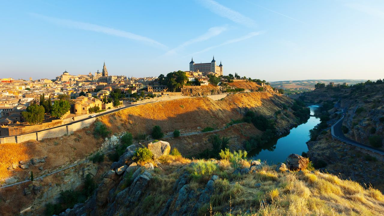 Toledo on its spur above the Tagus, the shape the flight is sold on.