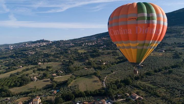 Hot air balloon ride over Assisi with winery breakfast