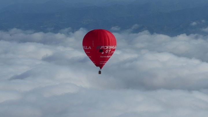 Over the clouds with a hot-air balloon