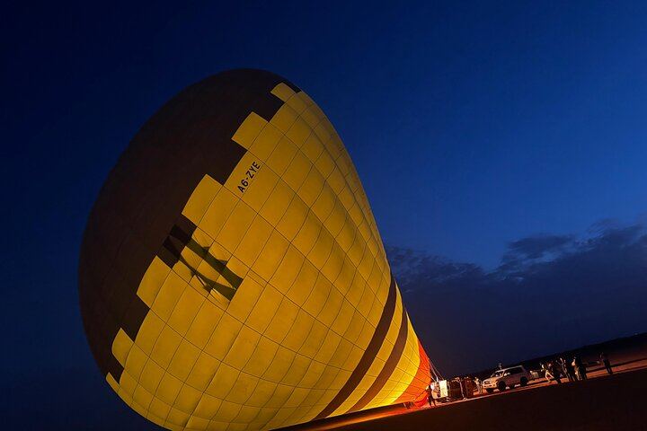 Preparing for lift-off under the twilight sky — the calm before your unforgettable hot air balloon adventure begins.