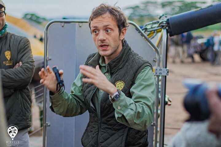 Welcome aboard! Our pilots greets guests and provide a quick briefing, ensuring you're ready for an unforgettable journey over the Serengeti with Miracle Experience.
